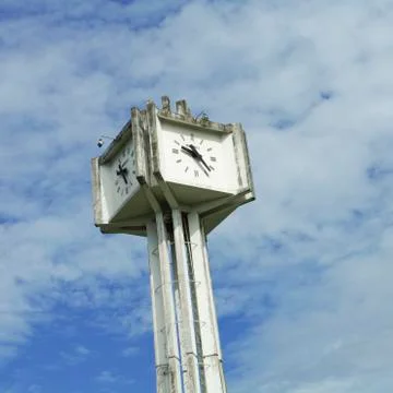 Big clock tower in clear blue sky Stock Photos