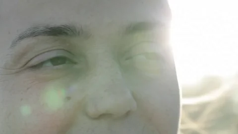 Big close up of young woman's face Stock Footage 74080314