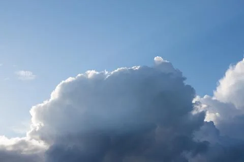 Big cloud on blue sky Stock Photos