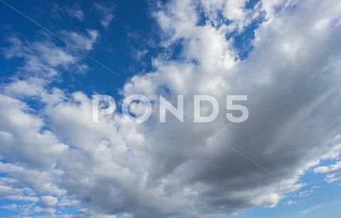 Big cloud over blue sky Stock Photos