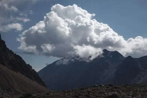 Big cloud over hills Stock Photos