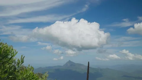 Big cloud in sky above mountain 스톡 동영상 297713492