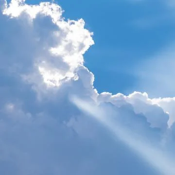 Big clouds and light beam Stock Photos