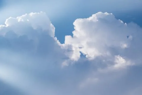 Big clouds and light beam Stock Photos