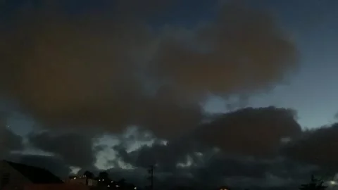 Big Clouds Flowing By At An Early Night 스톡 동영상 245247774