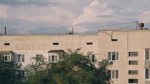 Big clouds over an apartment building Stock Footage 126885250