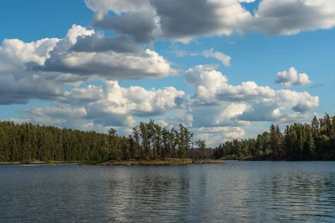 Big clouds over lake Stock Footage 128391192
