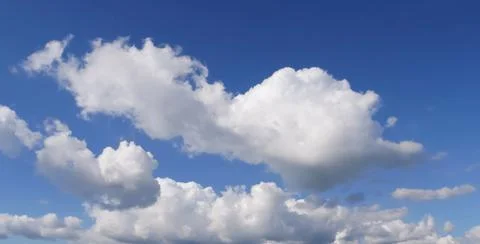 Big clouds over navy-blue skies 스톡 사진