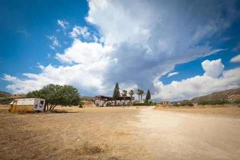 Big clouds in the sandy valley Stock Photos