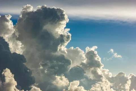 Big clouds on sky at sunset Stock Photos
