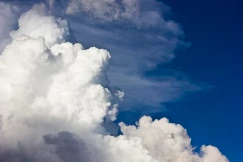 Big clouds on sky at sunset Stock Photos