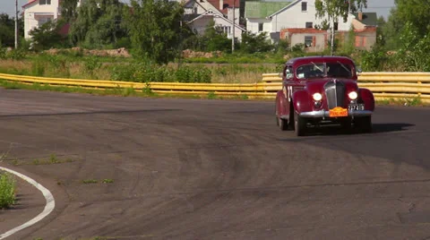 Big clumsy Chrysler Imperial Airflow and Ford Model T Phaeton pre-war retro cars 動画素材 26452753