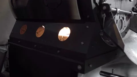 Big coffee roaster machine with the burner on Stock Footage 219592231