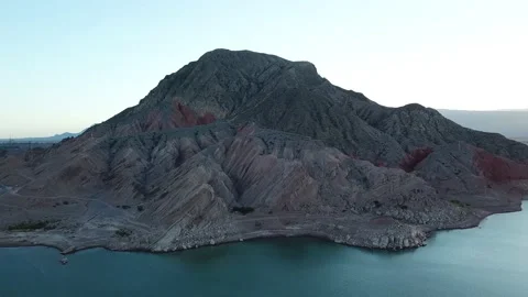 Big colorful mountain over a lake San Juan Stock Footage