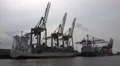 Big container ships and dockside cranes in Hamburg harbour HD Footage