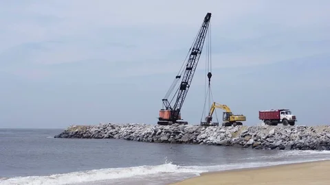 Big Crane working in beachside Stock Footage 102702250