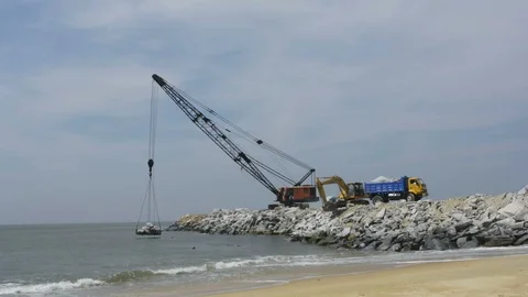 Big Crane working in beachside Stock Footage 102703405