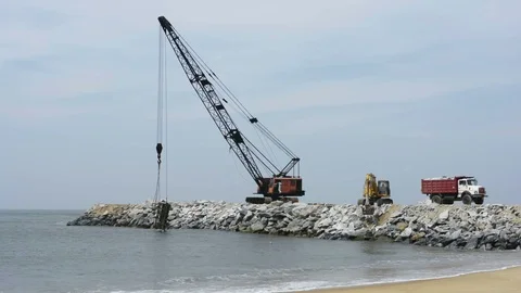 Big Crane working in beachside Stock Footage 102703431