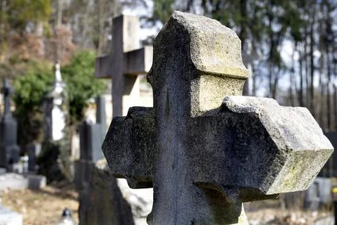 Big cross on graveyard Stock Photos