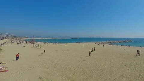 Big Crowd On A Spring Cold Beach Stock Footage 86475355