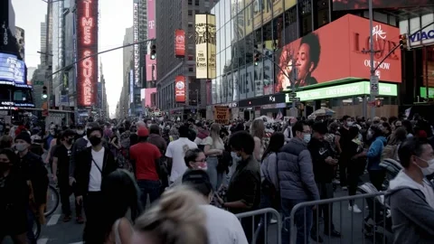Big crowd at Time Square following 2020 Biden presidential win Stock Footage 142724305
