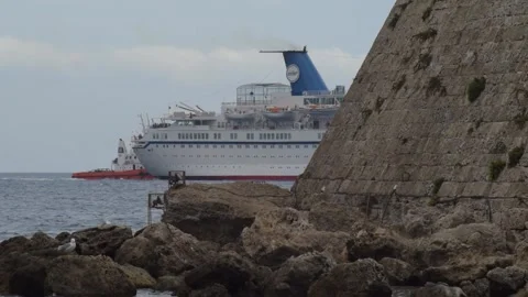 A big cruiser ship passing through Stock Footage 139159694