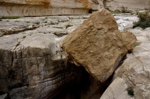 Big cube stone in Nahal Darga canyon ,Judean desert, Israel Stock Photos
