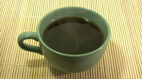 A big cup of steaming hot coffee. Yummy! (High Definition) Stock Footage 69232