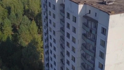 Big damaged building. Consequences of nuclear explosion at Chernobyl nuclear Stock Footage 108123599