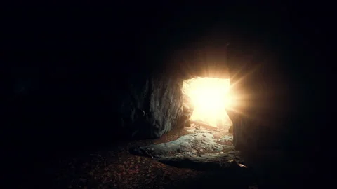 Big dark cave and sun light from jungle forest Stock Footage 165105564