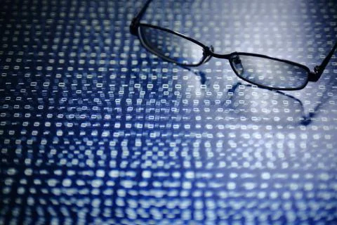 Big data analysis. blue binary code on led panel with black background and gl Stockfoto's