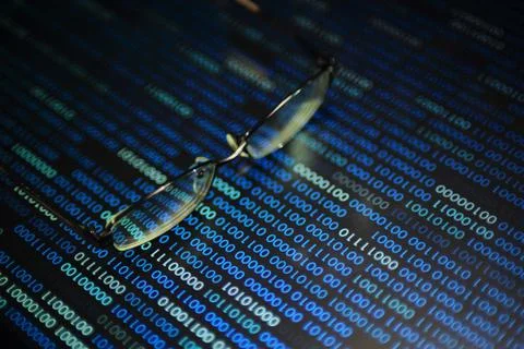 Big data analysis. blue binary code on led panel with black background and gl 库存照片