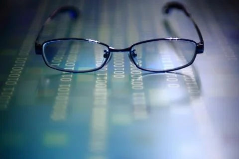 Big data analysis. blue binary code on led panel with black background and gl 库存照片