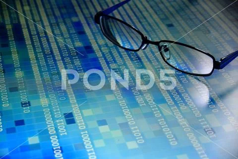 Big data analysis. blue binary code on led panel with black background and gl Stock Photos