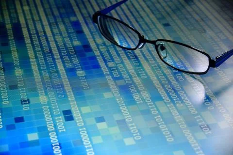 Big data analysis. blue binary code on led panel with black background and gl Stock Photos