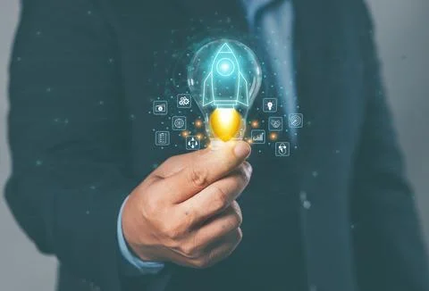 Big data concept: hand-holding light bulb (idea) with rocket launch, global.. Stock Photos