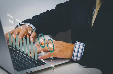 Big data graph with computer laptop virtual screen in economic analysis and i Foto stock