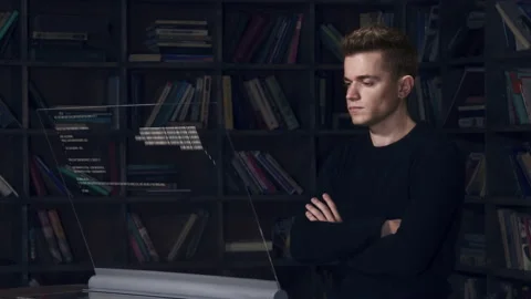 Big data programmer looking at program code on transparent screen Stock Footage 152702921