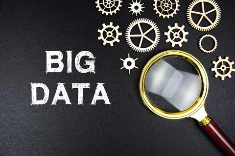 Big Data text message with magnifying glass on black background Stock Photos
