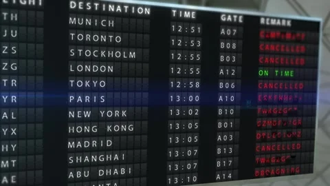 Big departure board flips every single flight to cancelled one by one. Stock Footage 330253694