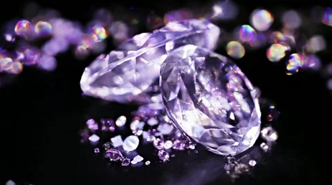Big diamonds with many violet small one rotating Stock Footage