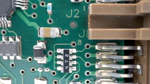 Big diodes and tiny capacitors on the circuit board Stock Footage 138540031