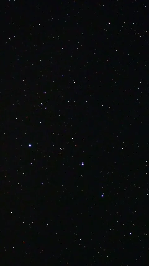 Big dipper constellation shimmering in the night sky as a satellite crosses the Stock-Footage 341282843