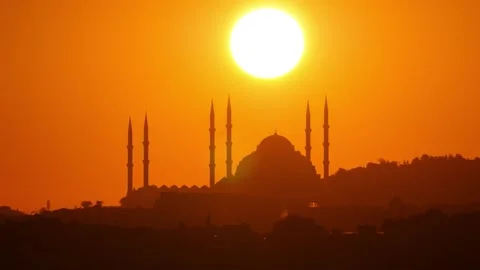 Big disk of sun and silhouetted mosque, iconic morning view of Istanbul city Stock Footage 259460167