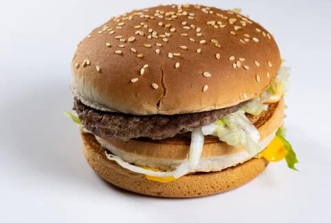 Big double hamburger on white background prepared for cropping Stock Photos
