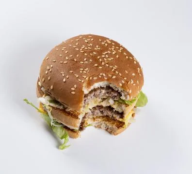 Big double hamburger on white background prepared for cropping Stock Photos