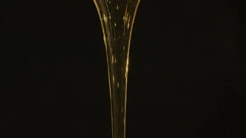 Big drop and stream of golden floral sugar honey flows against Stock Footage 309952073