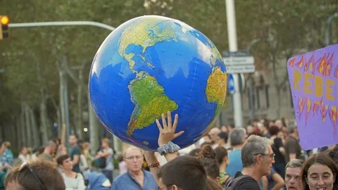 Big Earth Globe. Posters against Global Warming and People. Global Strike Stock Footage 116796220