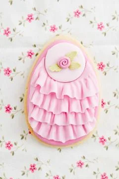 Big Easter eggs sugar cookie with fondant rose and pink ruffles Stock Photos