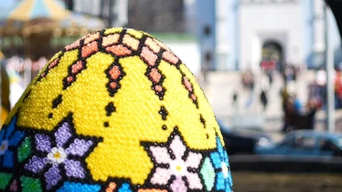 Big Easter hand made egg with street background Stock Footage 88295350